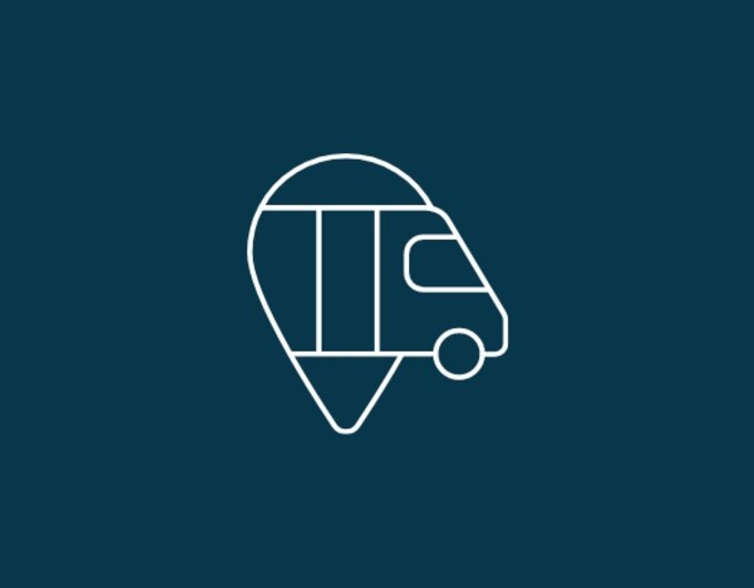 White motorhome location marker as a line icon on a dark blue background