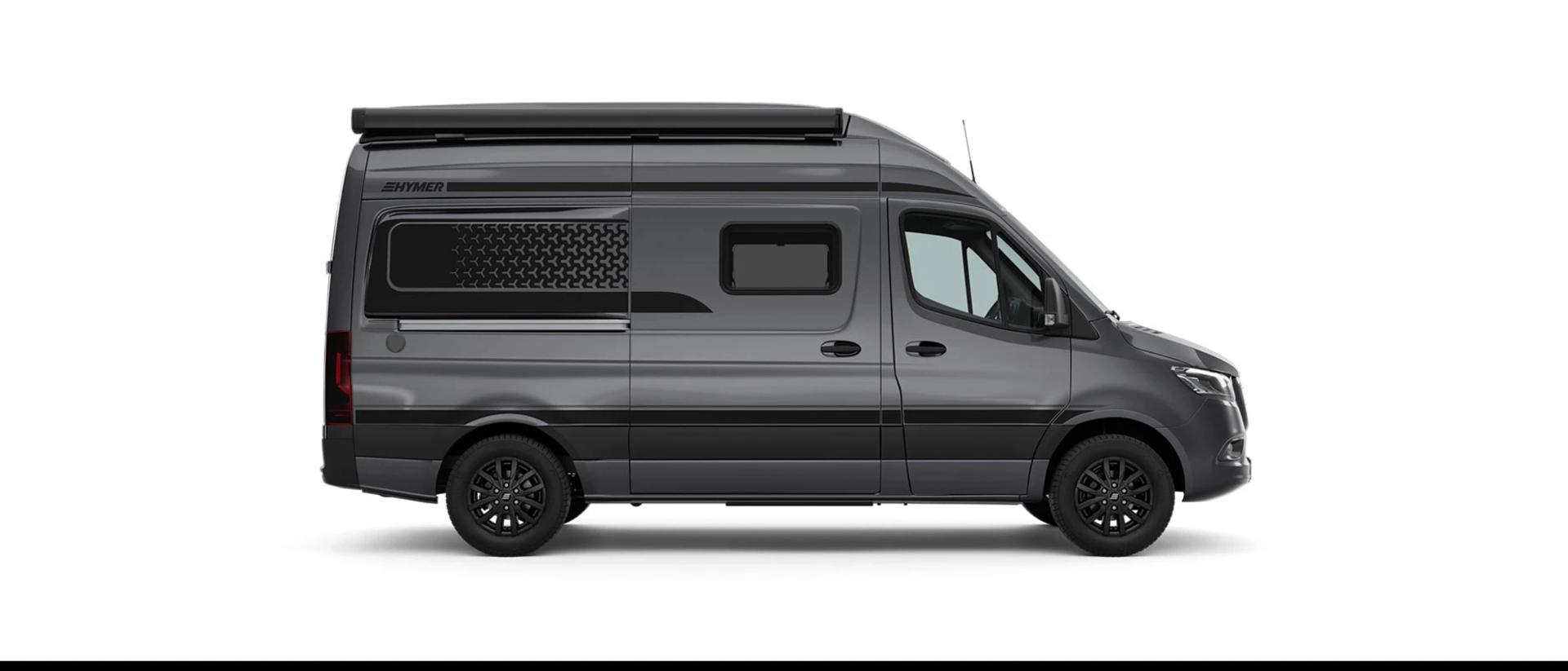 Side cut-out of a dark grey campervan showing the passenger side. The campervan has a black awning and dark design decals on the rear window.